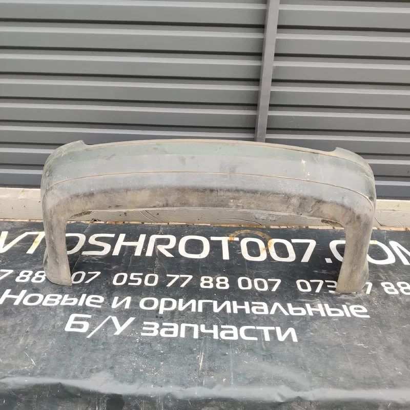 Бампер Volkswagen Bora (98-05) 1.9 TDI задній OEM 1j9807421