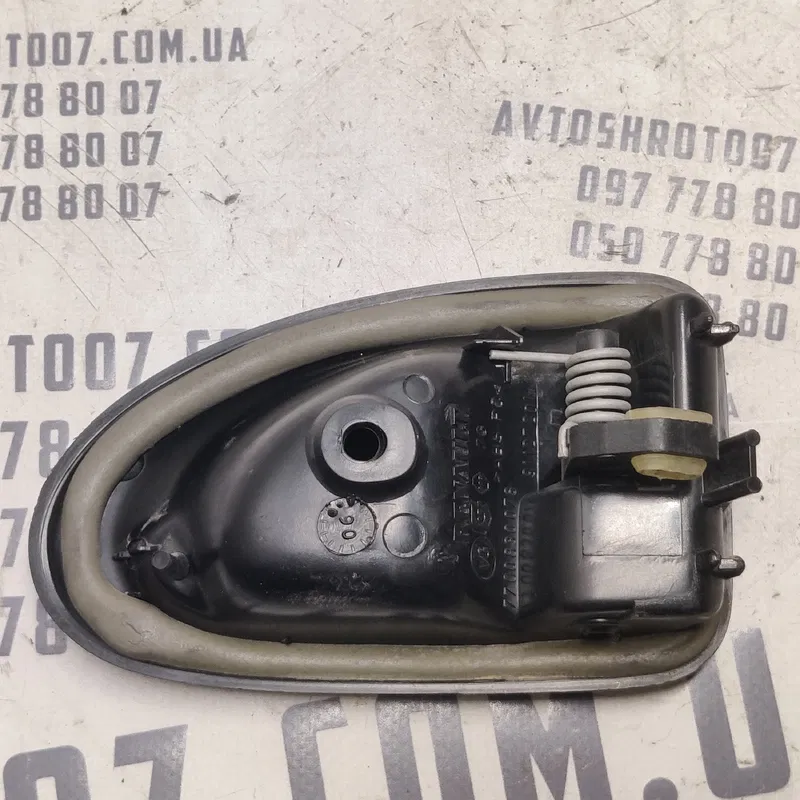 Дверна ручка Dacia Logan (04-12) 1.6 ліва OEM 7700830078