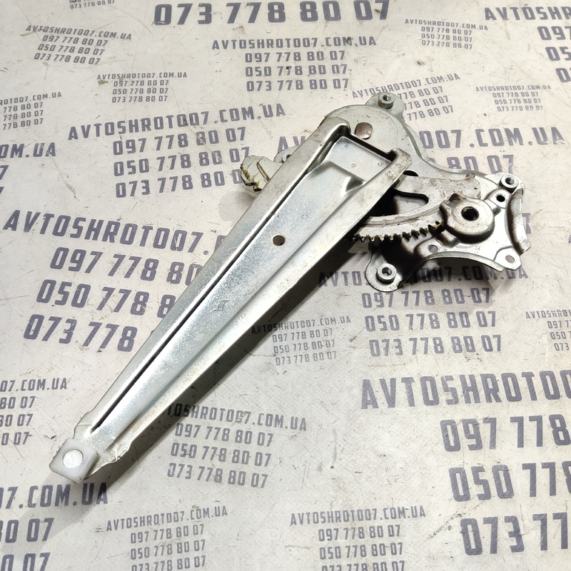 Склопідіймач Toyota Corolla 06-13 1.6 Benz зад. пр. OEM 2182