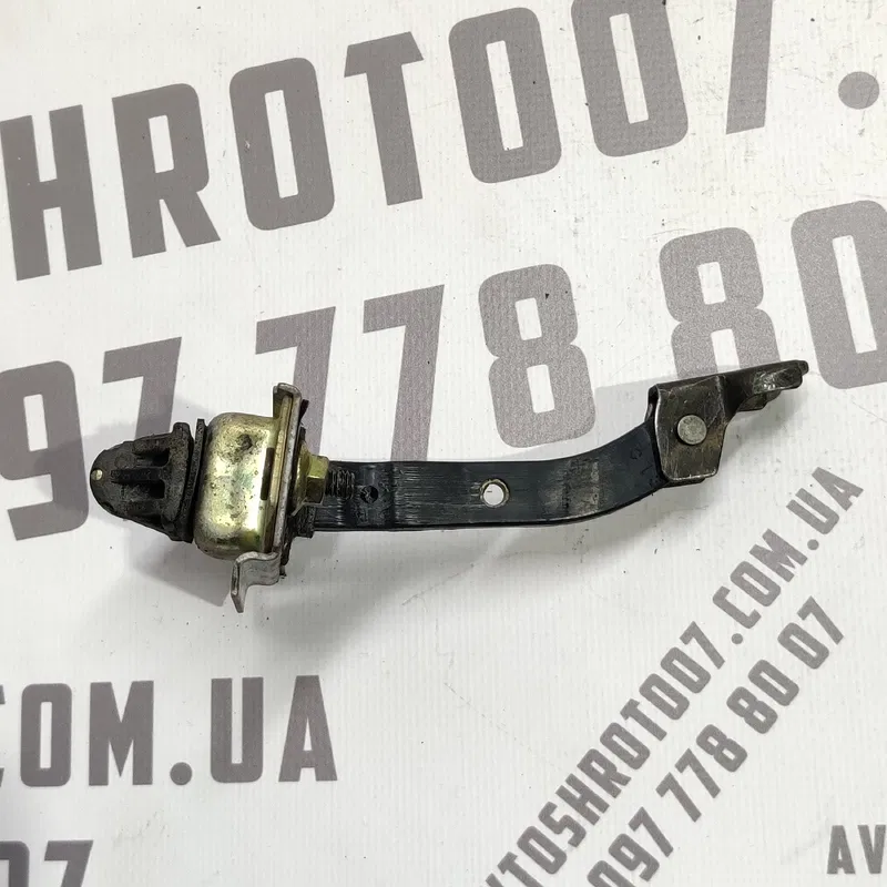 Обмежувач дверей Mazda Premacy (99-05) 1.8 передній правий