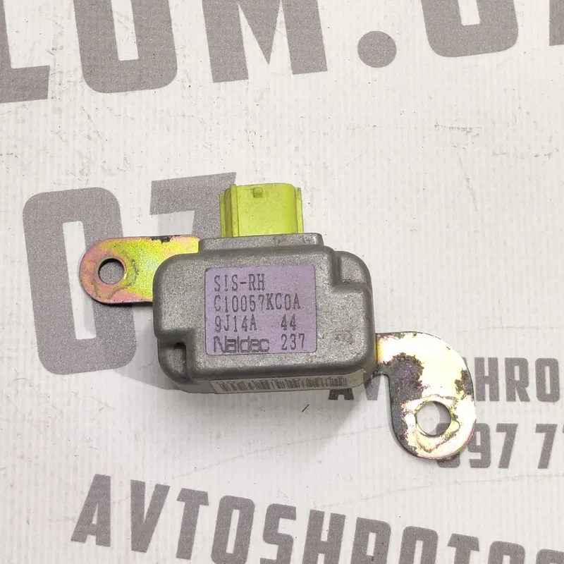 Датчик удару Mazda Premacy (99-05) 1.8Б прав. OEM c10057kc0a