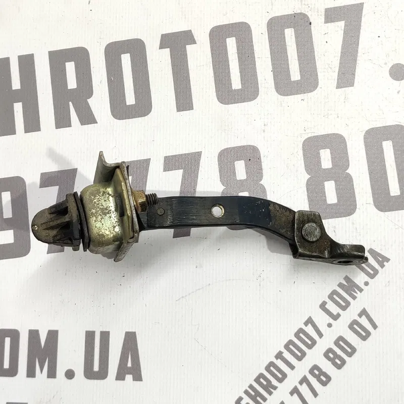 Обмежувач дверей Mazda Premacy (99-05) 1.8 передній правий