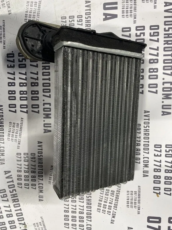 Радіатор пічки Skoda Octavia (96-10) 1.6 бенз OEM 1H1819031A