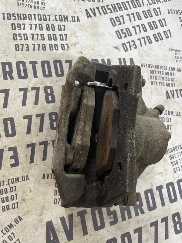 Супорт Jaguar X-Type 01-09 2.1 V6 перед. лів. OEM 0204y01128