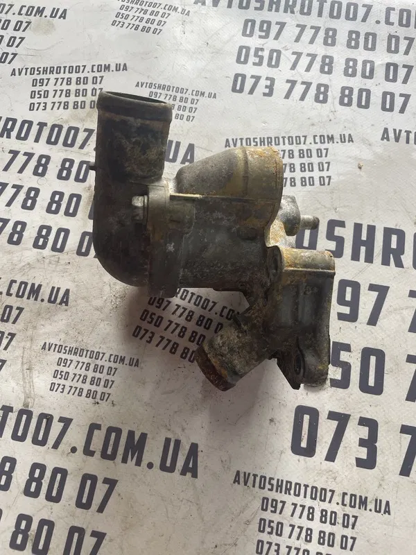 Корпус термостата Mitsubishi Lancer 9 (03-08) 1.3 OEM 500002
