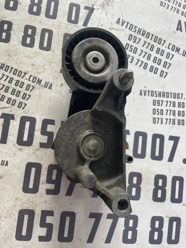 Натягувач Skoda Octavia A5 (04-13) 2.0 TDI OEM 03g903315a