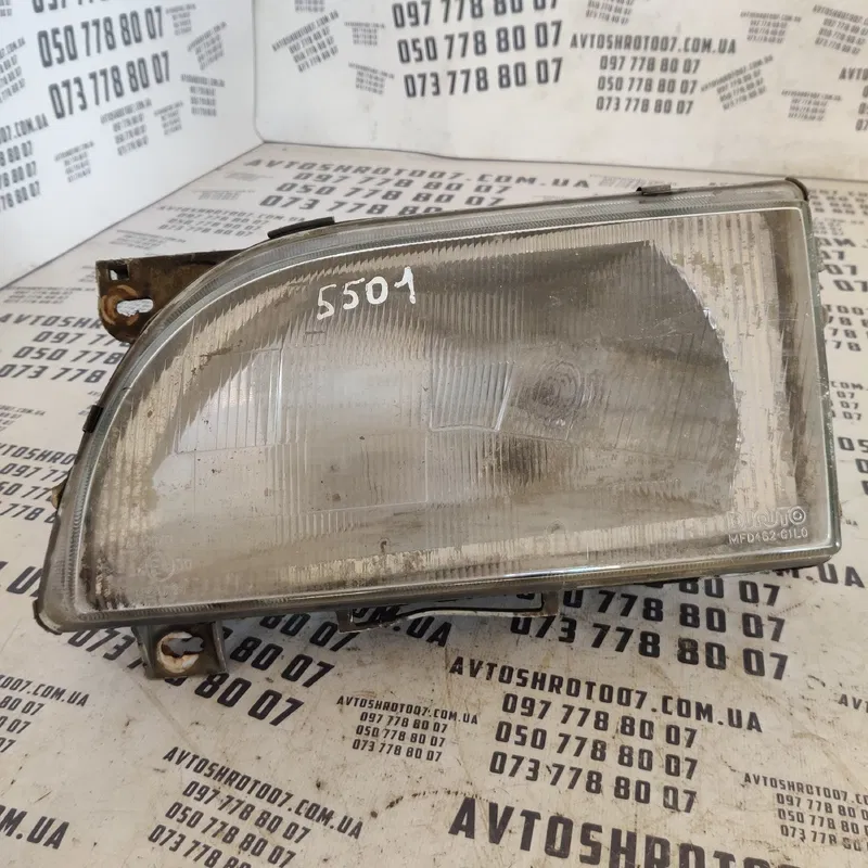 Фара Ford Transit (94-00) ліва OEM 205212b