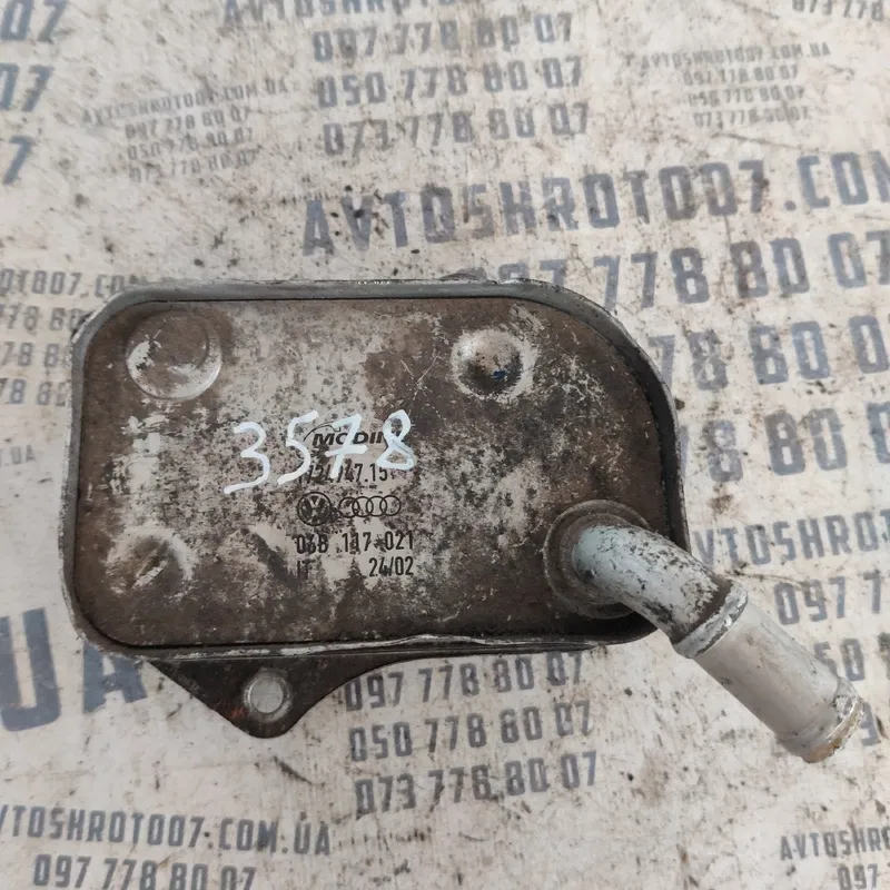 Радіатор масляний Volkswagen Sharan 1A OEM 06b117021
