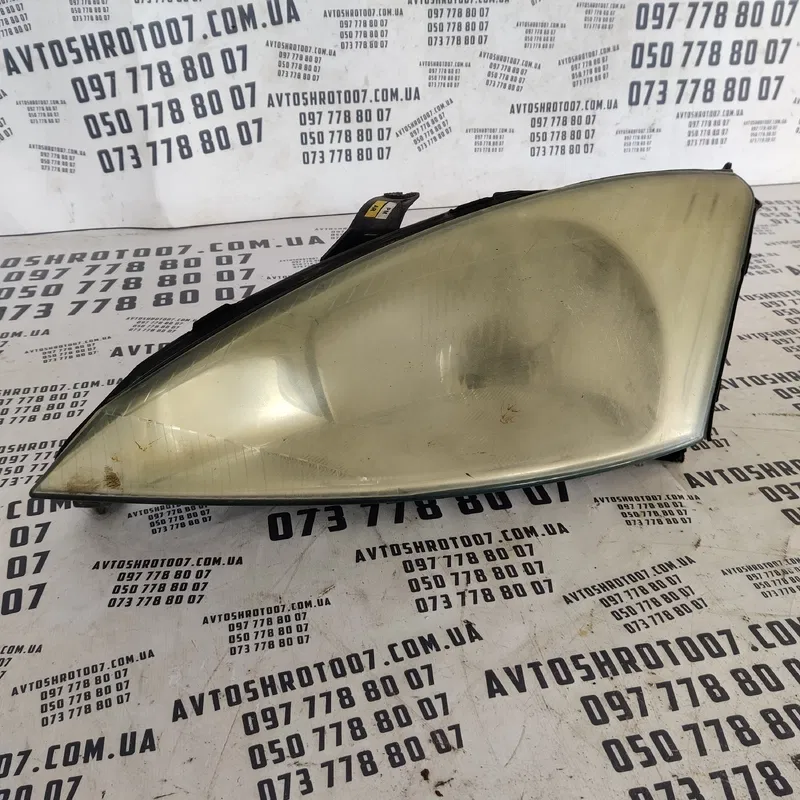 Фара передня ліва Ford Focus MK1 (98-04) OEM xs4113006