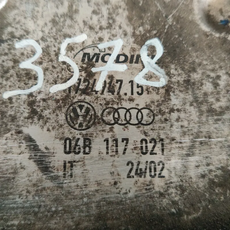 Радіатор масляний Volkswagen Sharan 1A OEM 06b117021