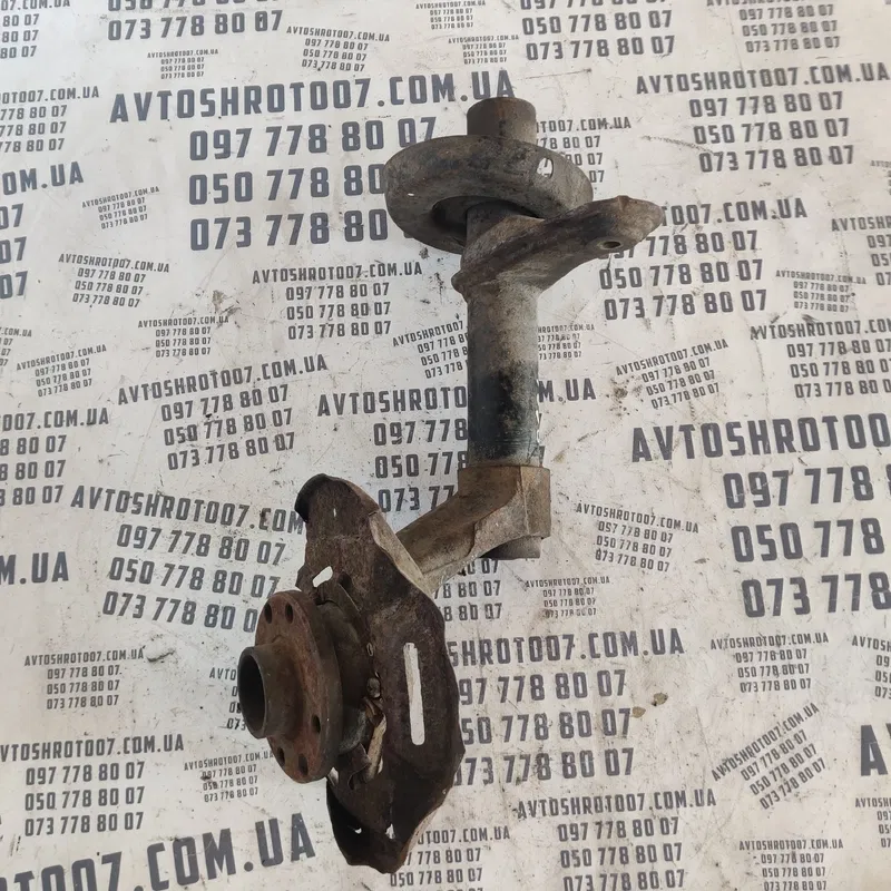 Поворотний кулак Opel Kadett (84-91) лівий OEM 90184974