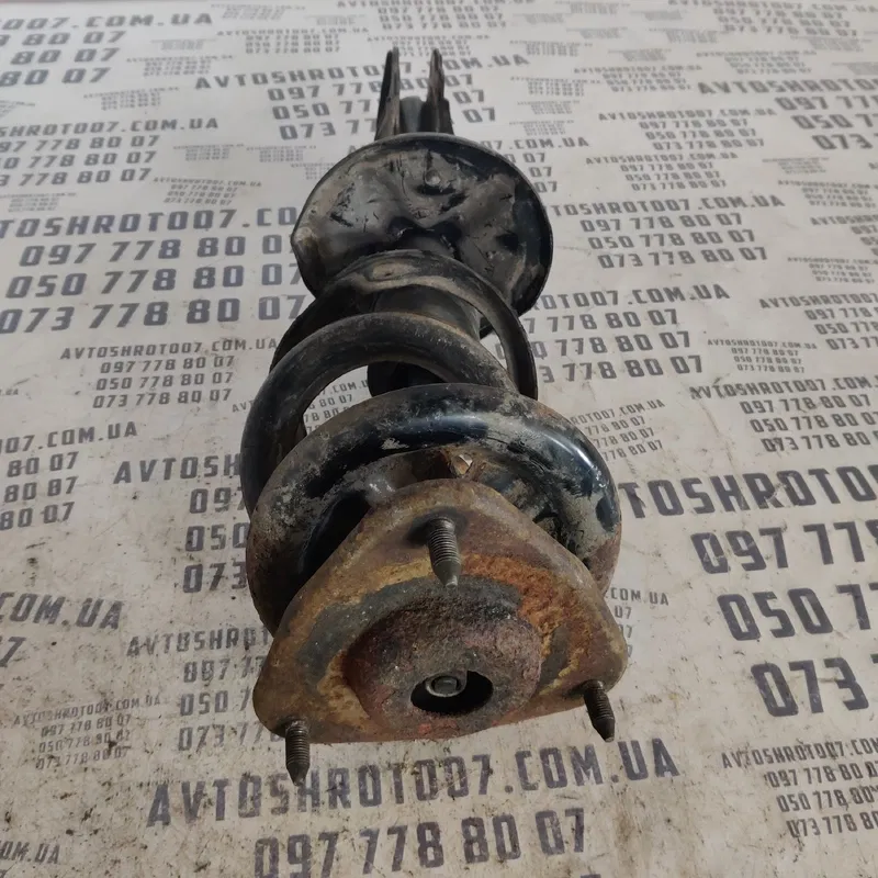 Амортизатор Mitsubishi Lancer 9 (03-08) передній OEM 2333381