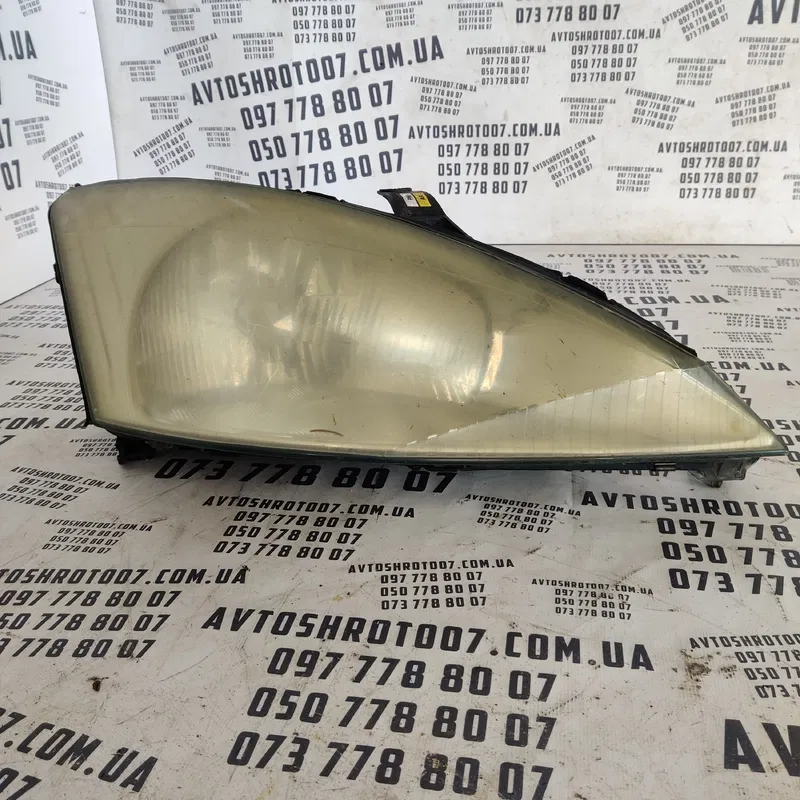 Фара Ford Focus MK1 (98-04) передня права OEM xs4113005