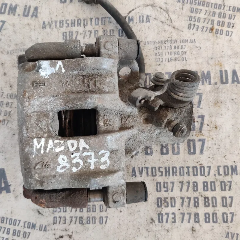 Тормозний супорт Mazda 3 BK (03-09) зад. лів. OEM 2008814LBO
