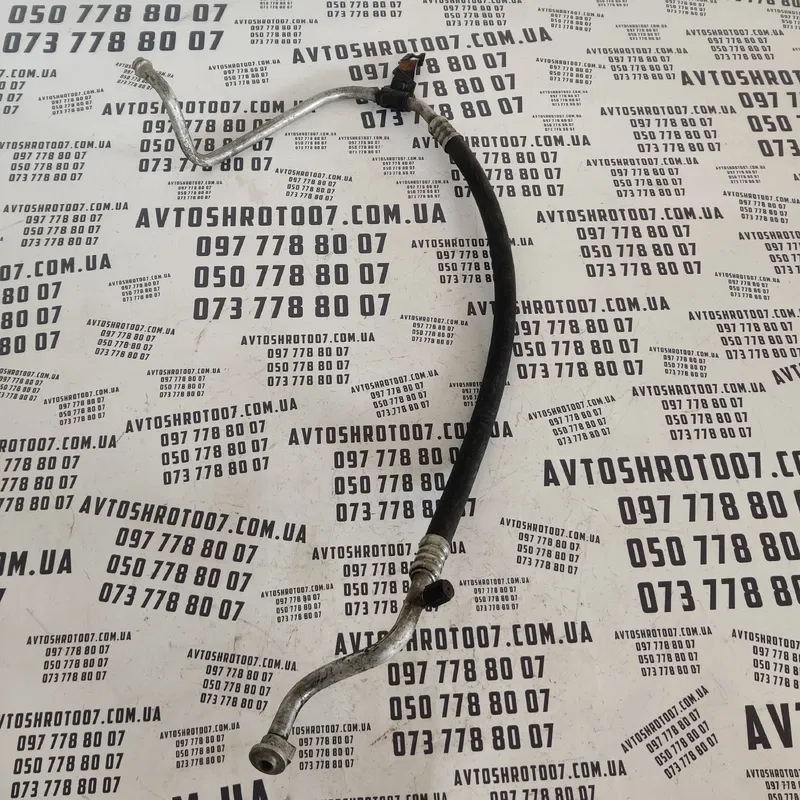 Трубка кондиціонера Chrysler Voyager 3 (95-00) OEM 04677282b