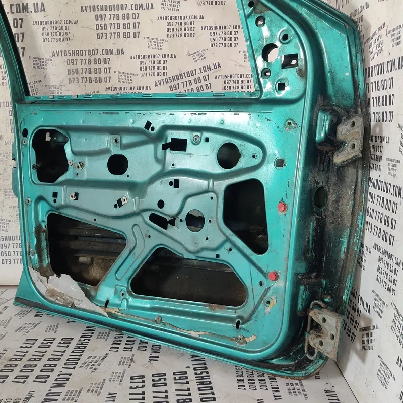 Двері передні ліві Fiat Punto OEM E79720