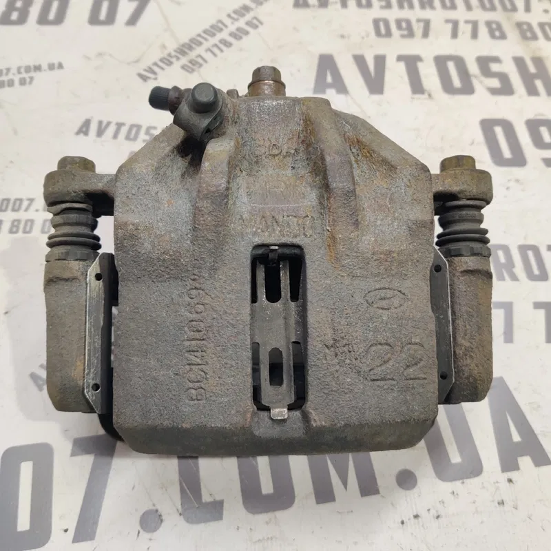 Супорт Hyundai Elantra 3 (00-06) 1.6 бенз. передній правий