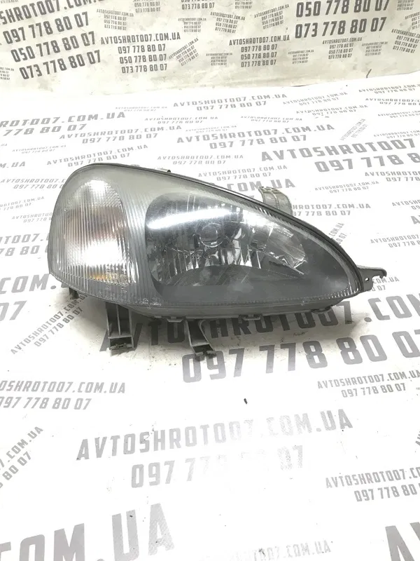 Фара Chevrolet Tacuma (00-08) 2.0 Бенз. Права OEM 0301001116