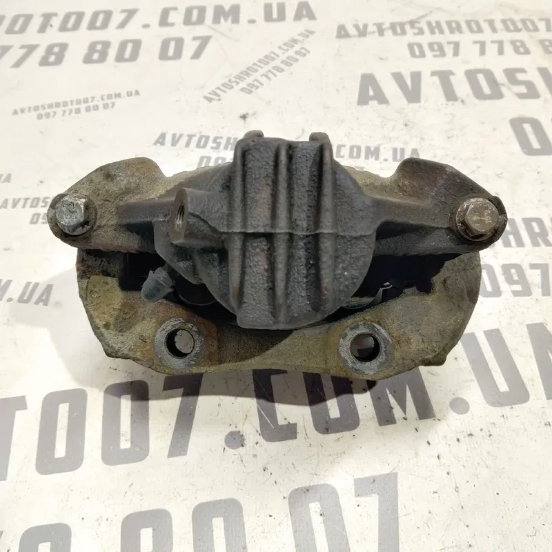 Тормозний супорт Peugeot 307 (01-08) 1.4 Бензин перед. лівий