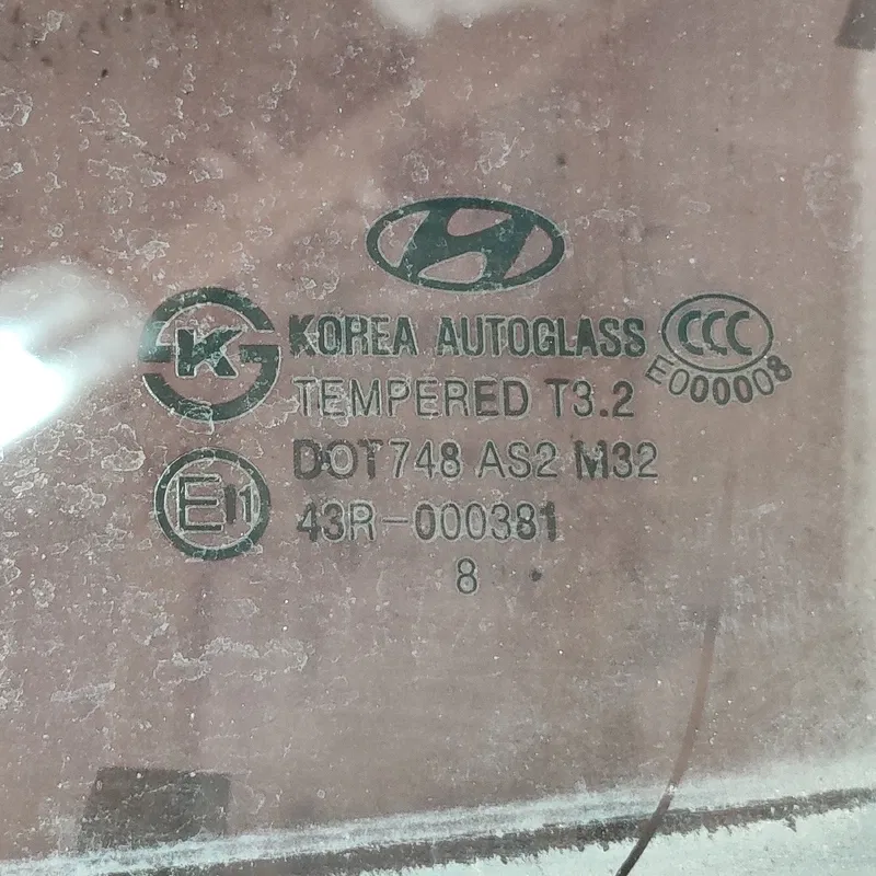 Скло дверей заднє ліве Hyundai Elantra 4 (06-11) 834112H010