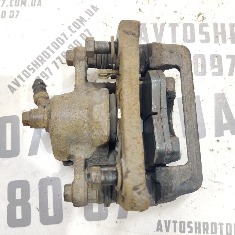 Супорт Hyundai Elantra 4 (06-11) 1.6 бенз задній правий