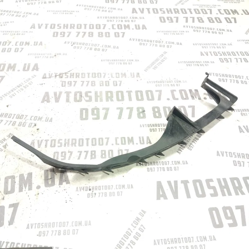 Кронштейн бампера передній лівий Mazda 6 GY (02-07) 2.0