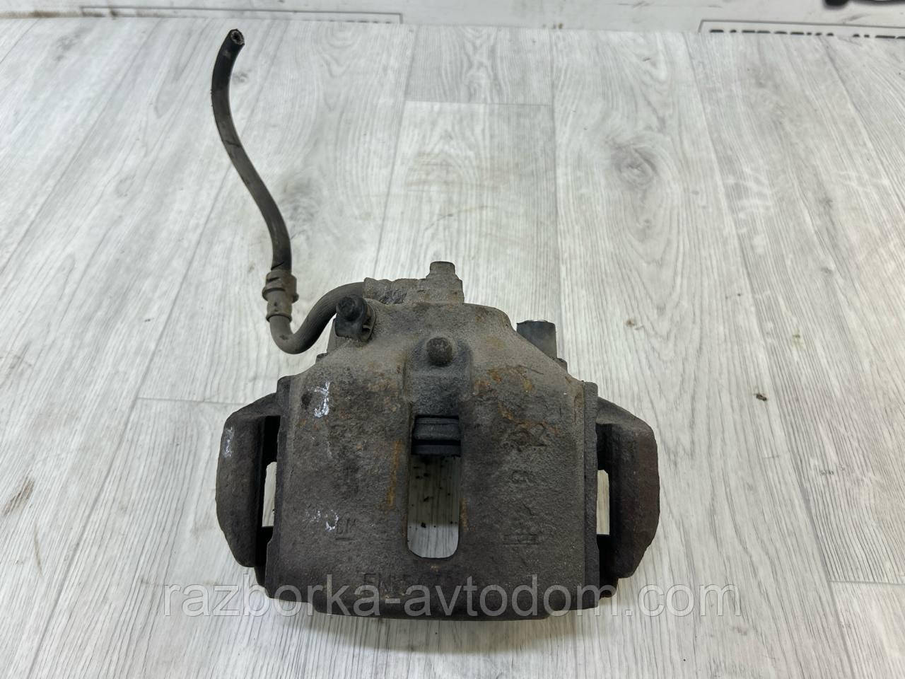Суппорт Передній правий Opel Omega B (93-99) OE:90509197