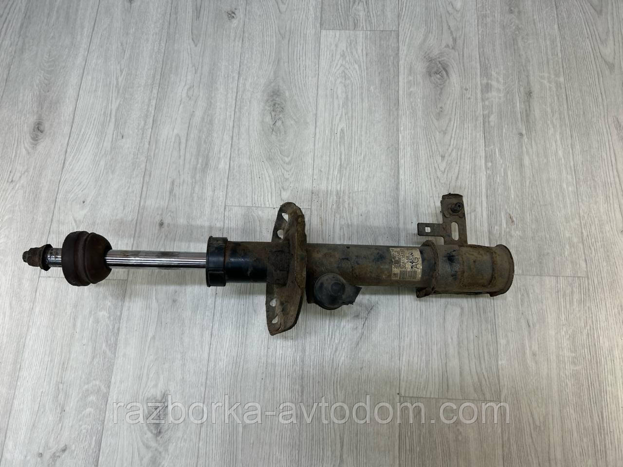 Амортизатор передній лівий Opel Astra H, Zafira B OE:24466546, 93179398