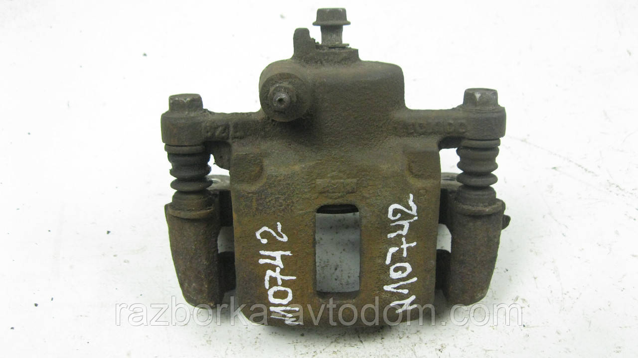 Суппорт передній правий Nissan Sunny B11 (1982-1986), B12, N13 (1986-1988) OE:4100105A90