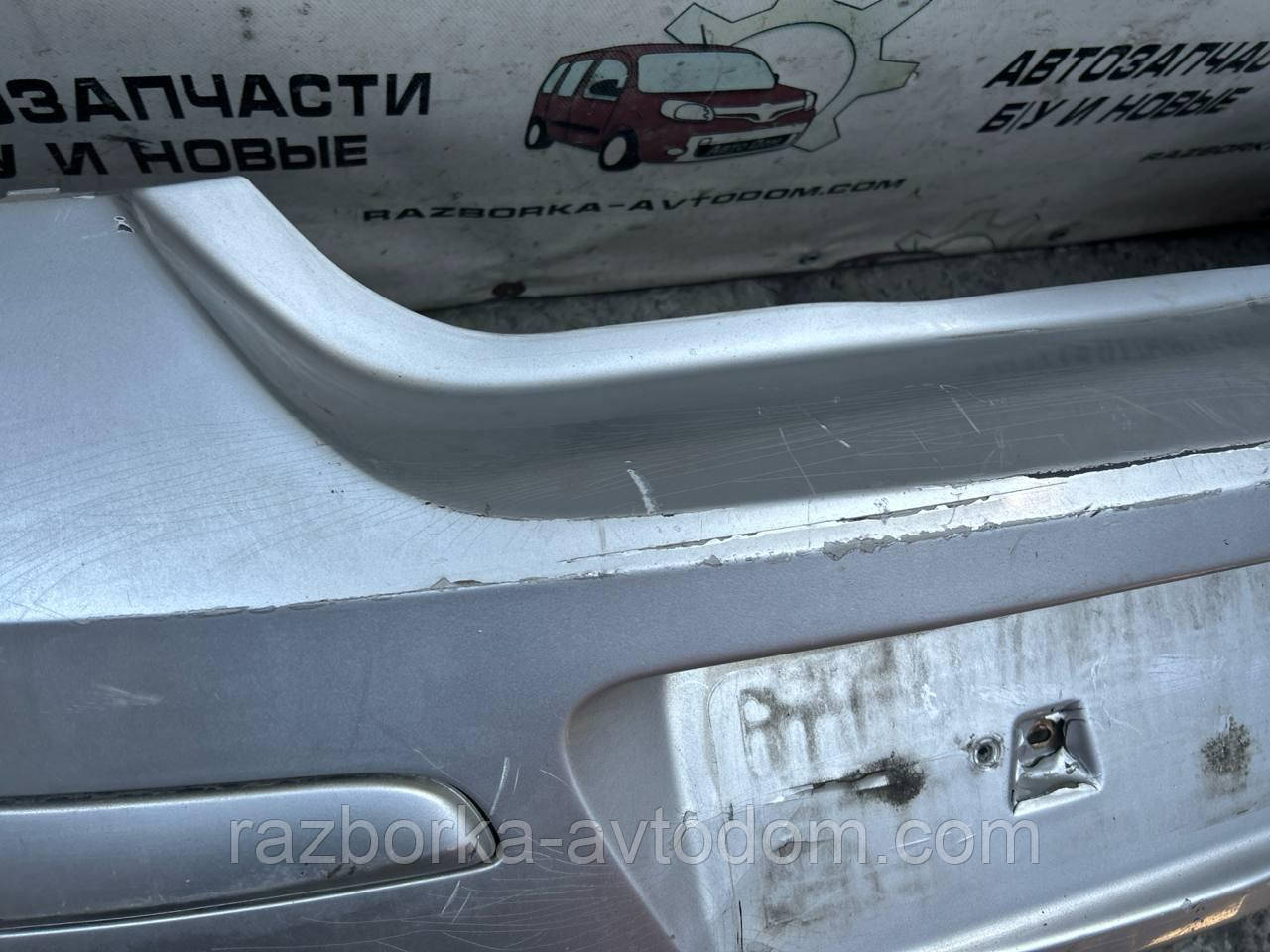 Бампер задній хетчбек OPEL ASTRA H (05-15) OE:24460353 Дефект