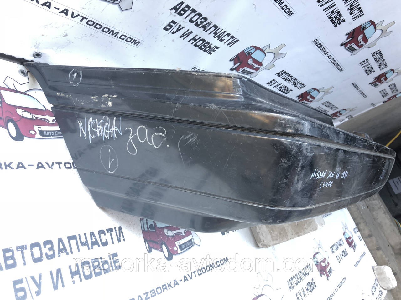 Бампер задній Nissan Sentra купе (85-90) 8502265A00