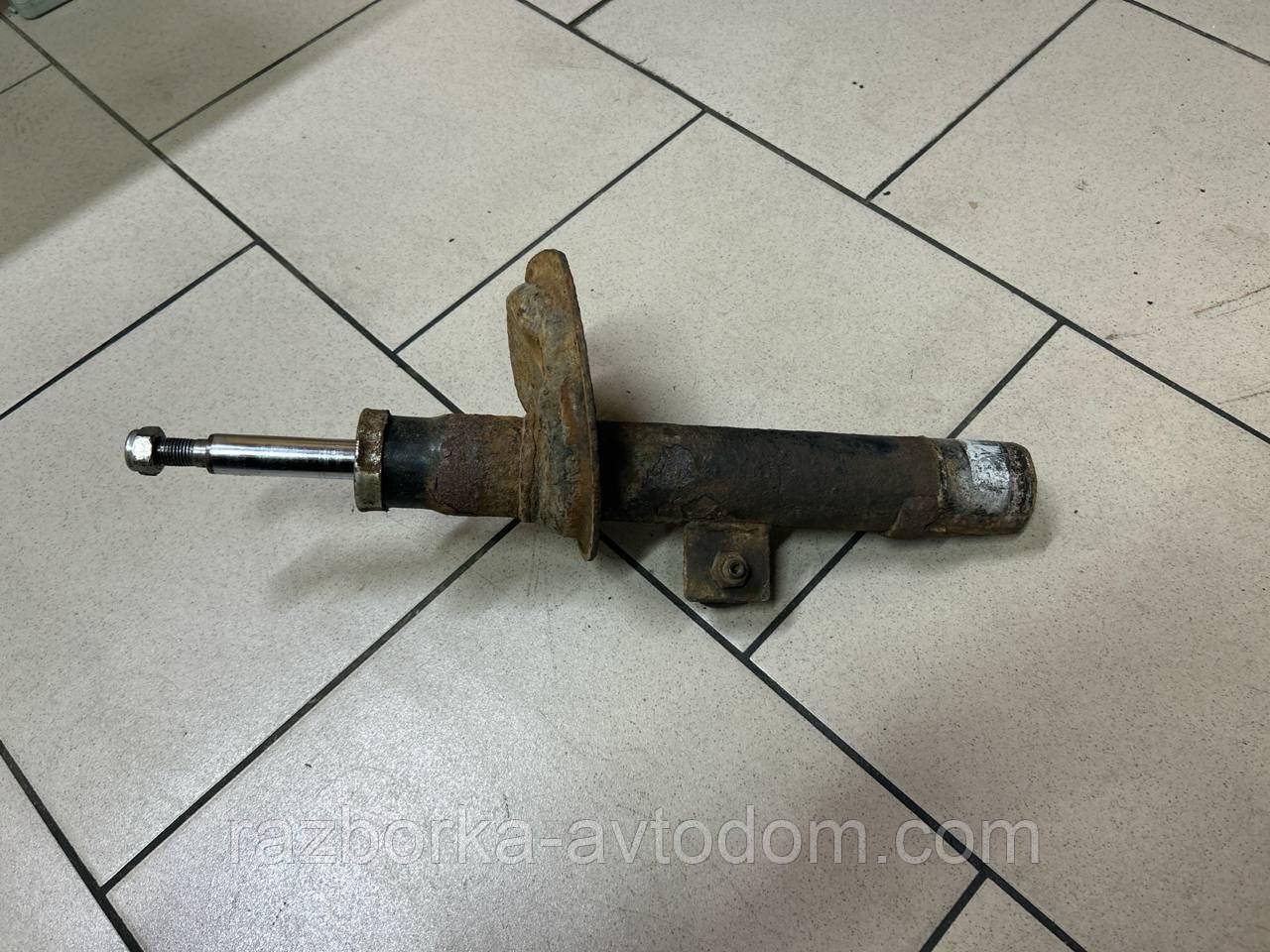 Амортизатор передній лівий Citroen Berlingo (03-08), Peugeot Partner (03-) OE:5202GP
