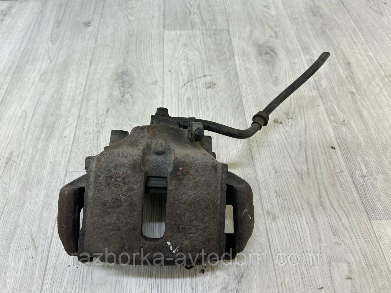 Суппорт Передній лівий Opel Omega B (93-99) OE:90509196