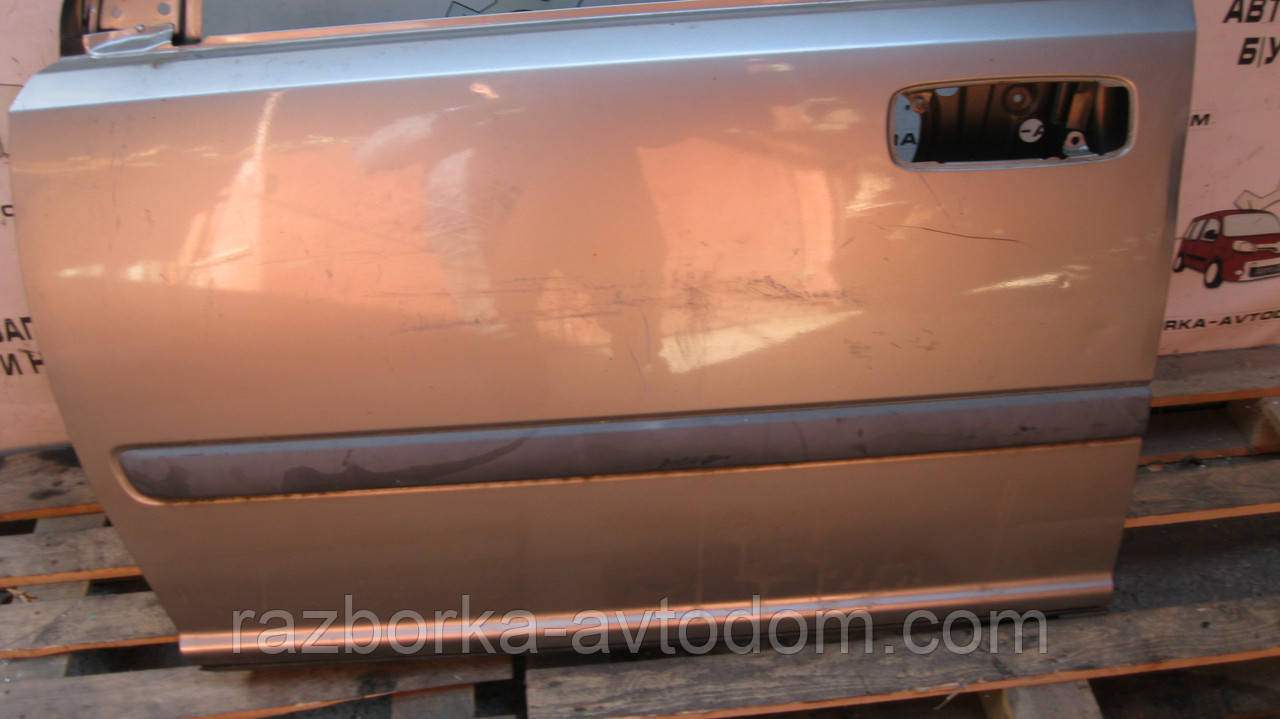 Двері передня ліва Nissan X-trail T30 (01-07) OE: H01018H7MM Дефект: подряпини та вм'ятинка незначна