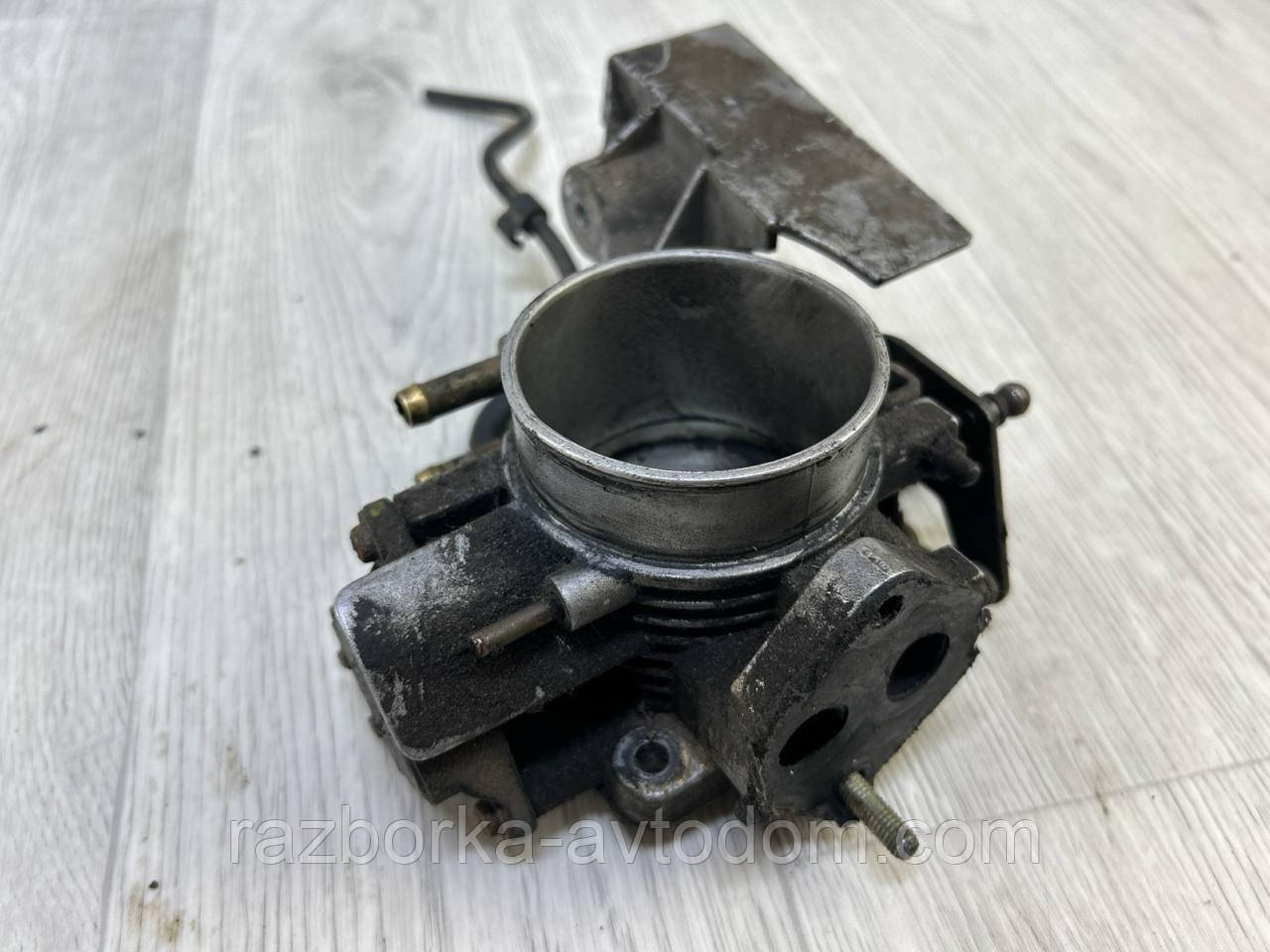 Дросельна заслінка 2,0i 16V x20xev Opel Omega B (93-03) OE:90411550