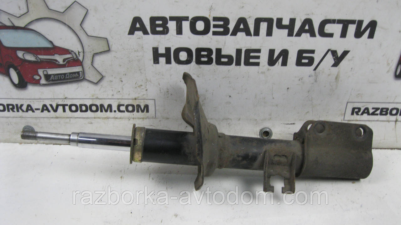 Амортизатор передній лівий Subaru Justy 2 (1995-2003), Suzuki Swift 2 (1989-2005) OE:4160280E20