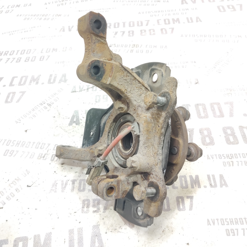 Цапфа передня ліва Opel Astra G (97-04) 2.0 дизель