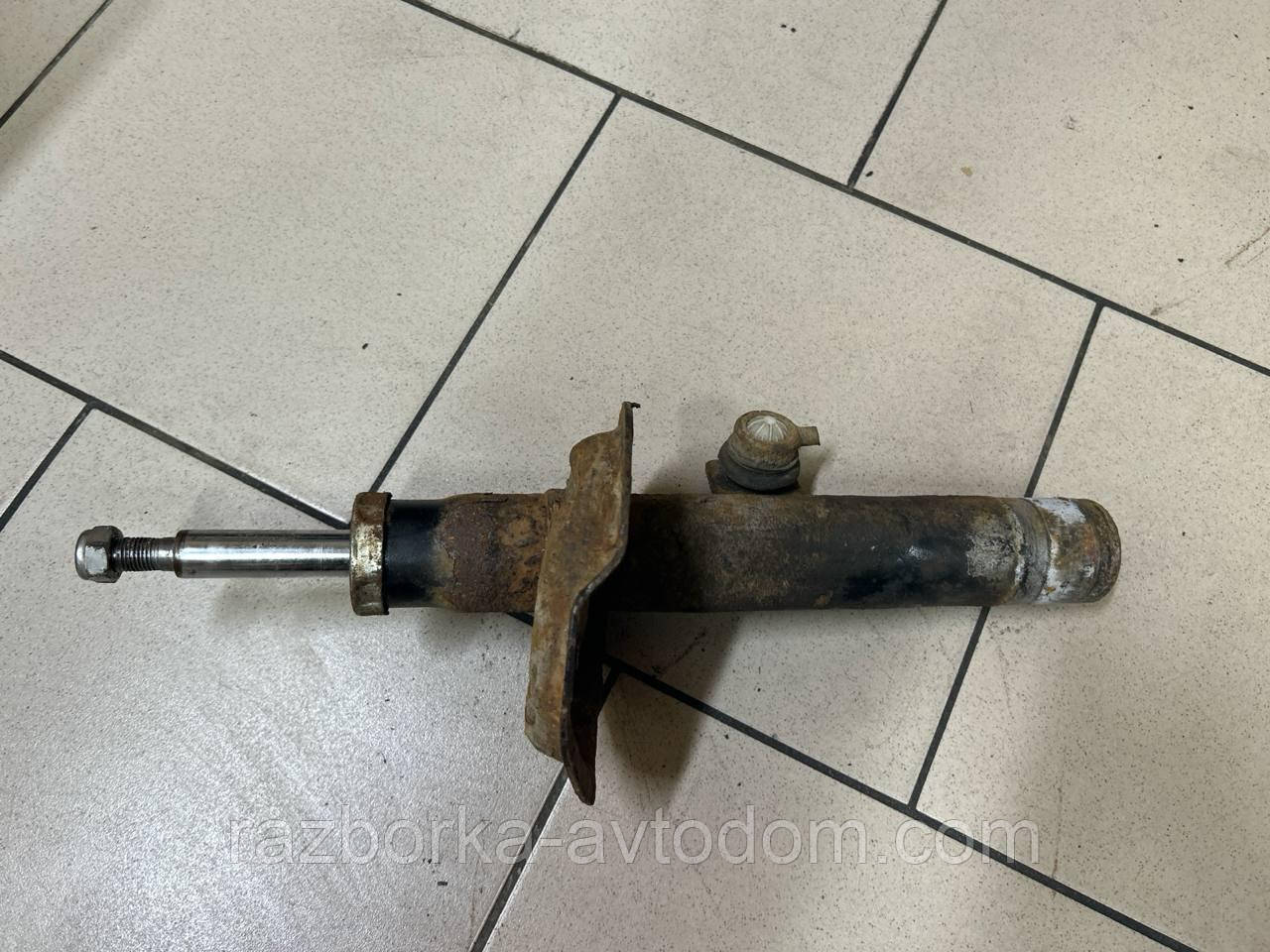 Амортизатор передній лівий Citroen Berlingo (03-08), Peugeot Partner (03-) OE:5202GP