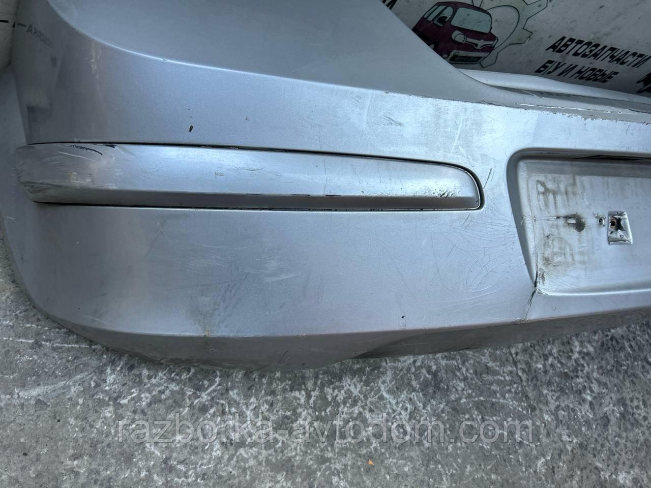 Бампер задній хетчбек OPEL ASTRA H (05-15) OE:24460353 Дефект
