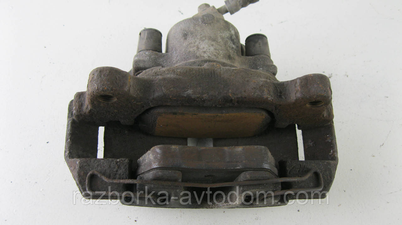 Суппорт передній правий VW Touran (03-10) (ATE), CAddy (04-15) OE:1K0615124E