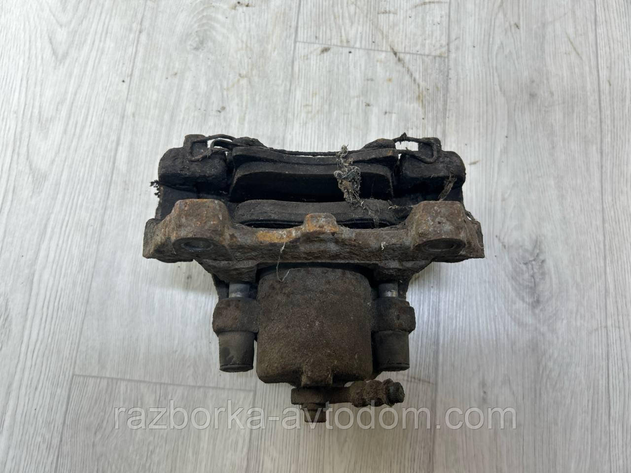 Суппорт передній лівий Opel Zafira B (05-10) OE:5542106, 93173271